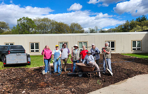 Waushara Food Pantry garden with volunteers